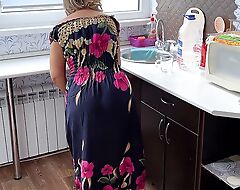 Under the dress of an traditional housewife hides her mature ass who wants assfuck sex