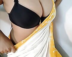 Desi bengali shruti bhabhi joking with her big natural tits in yellow saree