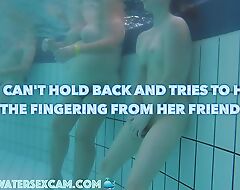 Crazy girl masturbates in a public pool together with tries round hide shut up I filmed her