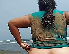 Pregnant slut Wife Shows Will not hear of pussy In Public Shore
