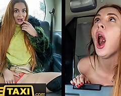 Fake Taxi Redhead MILF in sexy stockings rides a big chunky dick in a taxi