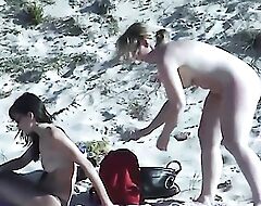 Uninhibited lesbian sex on be passed on beach