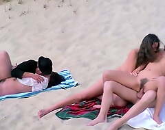 Group sex on a German beach, upscaled to 4K