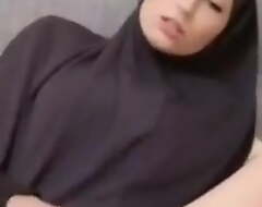 Hijabi girl rubbing bawdy cleft surpassing livecam