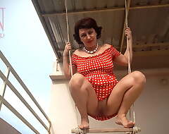 Uninhibited housewife swinging insusceptible to a swing not at home