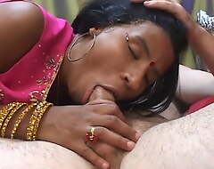 Young Indian lady gives an older man a blowjob