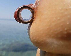 nippleringlover - horny milf pissing on hammer away nude beach, pierced pussy, wide open, huge pierced nipples